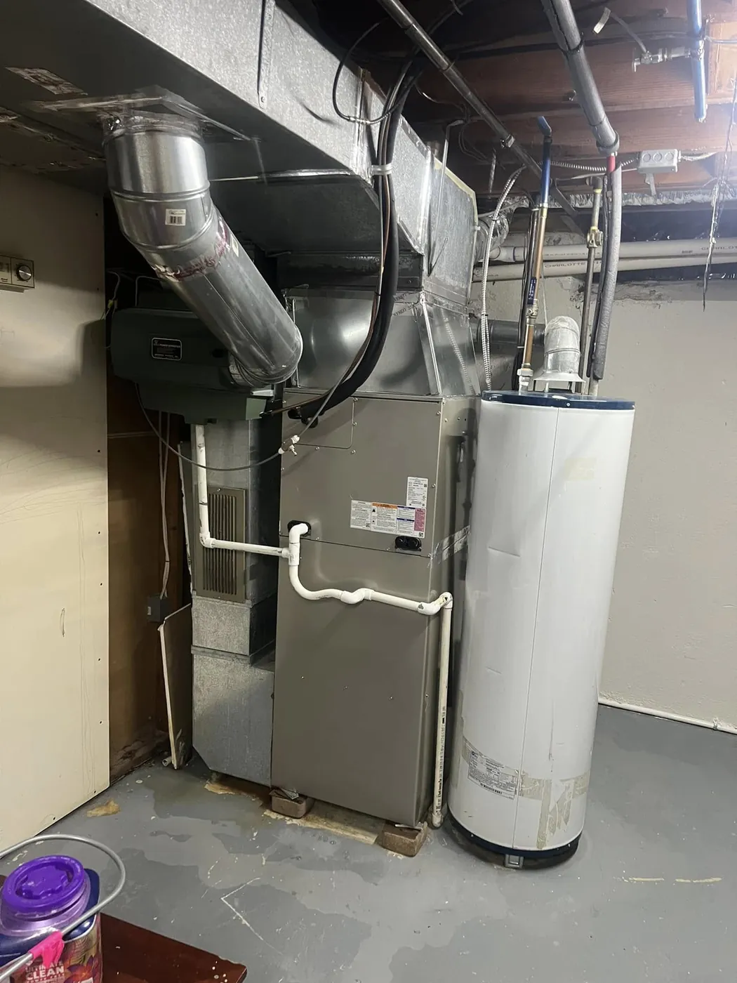 Furnace and water heater replacement in a finished basement