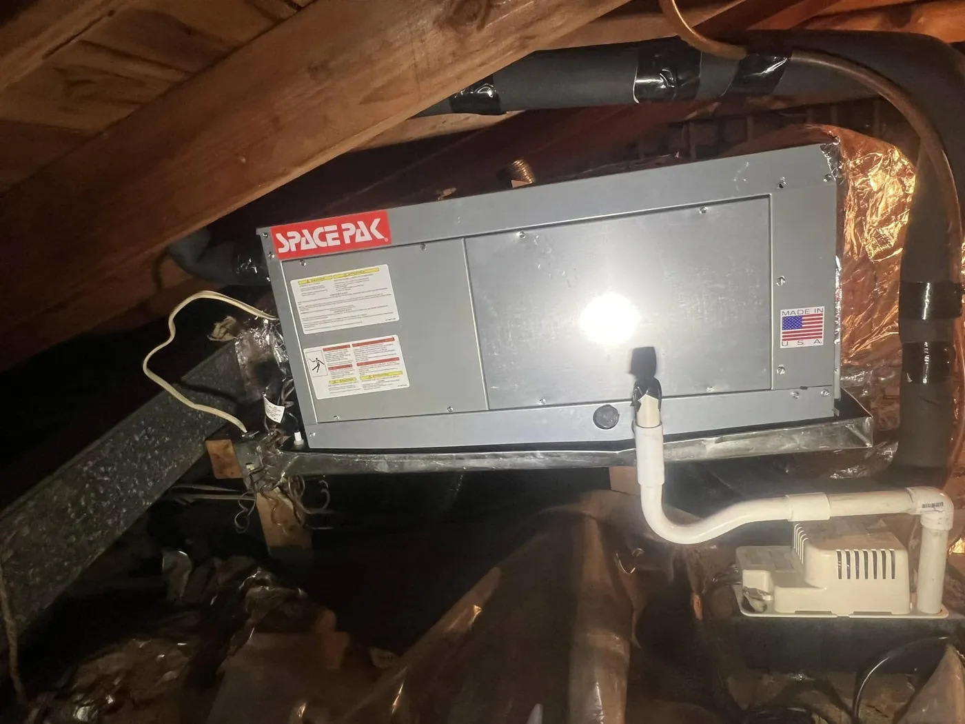 SpacePak air handler installed in an attic
