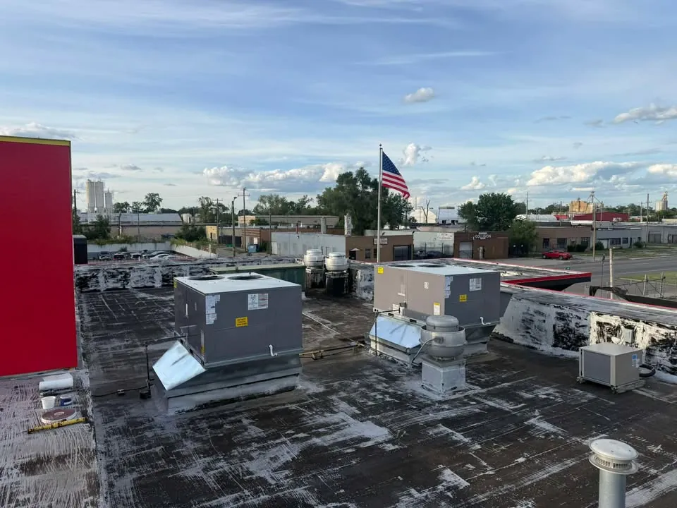 Commercial rooftop HVAC units on a Metro Detroit building